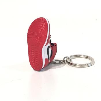 Hand stitched leather keychain upcycled from a beater AJ1 Homage to Home.